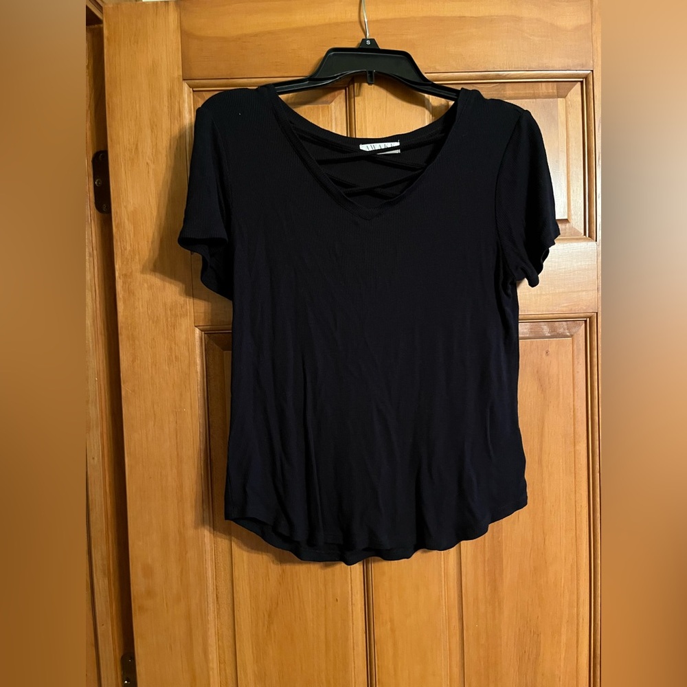 Black short sleeve top with crisscross detail